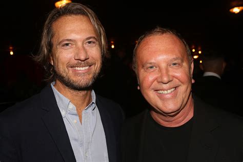 michael kors gets a buy rating from oppenheimer|michael kors husband.